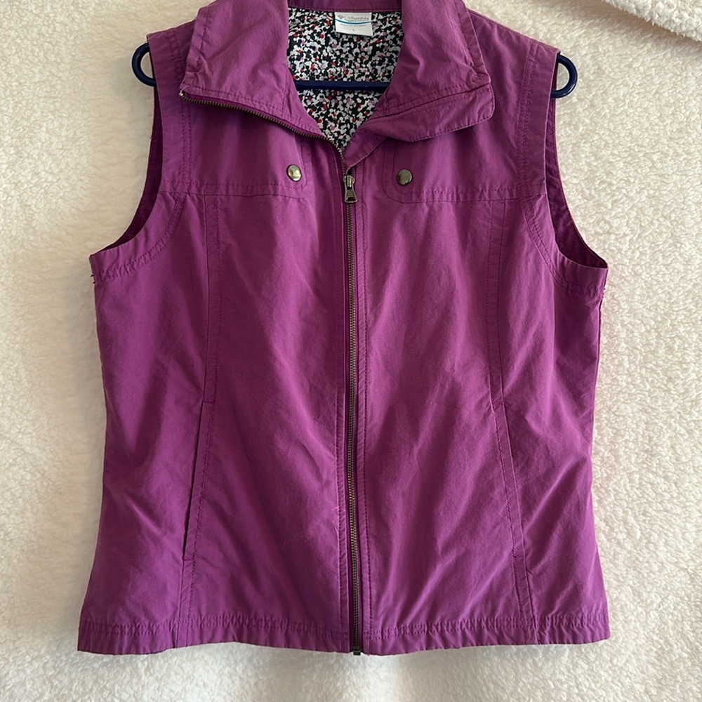 Columbia purple vest. Size lge. Front pockets lined.